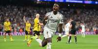  Foto: Denis Doyle/Getty Images - Legenda: Vini Jr comemora um dos gols da vitória sobre o Borussia Dortmund / Jogada10