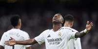  Foto: Divulgação / Real Madrid - Legenda: Vini Jr em ação com a camisa do Real Madrid pela Champions League / Jogada10