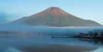 Uma foto do Monte Fuji visto sem neve em setembro de 2023  Foto: Getty Images / BBC News Brasil
