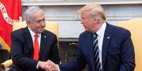 Donald Trump e Benjamin Netanyahu em encontro na Casa Branca em 2020  Foto: Getty Images / BBC News Brasil