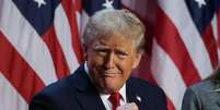 Donald Trump discursa como presidente eleito antes de projeções confirmarem vitória  Foto: REUTERS/Carlos Barria