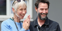 Keanu Reeves e  Alexandra Grant  Foto: Reprodução/Getty Images