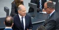 O atual chanceler federal, Olaf Scholz, e o líder oposicionista da CDU, Friedrich Merz   Foto: DW / Deutsche Welle