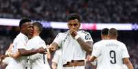  Foto: Denis Doyle/Getty Images - Legenda: Rodrygo em ação com a camisa do Real Madrid na Champions League / Jogada10