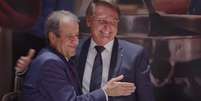 Jair Bolsonaro e Valdemar Costa Neto em cerimônia de filiação ao PL  Foto: Divulgação/PL / Estadão