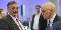 Ministros do STF Flávio Dino e Alexandre de Moraes comentam com humor reações às suas decisões na Corte durante participação em evento  Foto: Fabio Rodrigues Pozzebom/Agência Brasil / Estadão