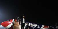 Jogadores do Botafogo desembarcam de avião do New England Patriots  Foto: Divulgação/Vitor Silva/BFR