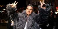 None  Foto: Robbie Williams ( Marc Piasecki/Getty Images) / Rolling Stone Brasil