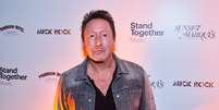 None Foto: Julian Lennon ( Lila Seeley/Getty Images) / Rolling Stone Brasil