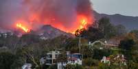 A idílica naturezaaplicativo de jogo de ganhar dinheiroPacific Palisades, que atraiu tantas celebridades e ricos, foi fortemente atingida por incêndios  Foto: Getty Images / BBC News Brasil