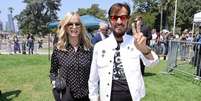 Ringo e sua esposa, Barbara Bach, em julho de 2024, durante um evento anual que celebra o aniversário do baterista Foto: Getty Images / BBC News Brasil