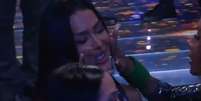 'Castigo por eu ser amante': Gracyanne Barbosa cai no choro ao ouvir música de Belo e Ludmilla no 'BBB 25'.  Foto: Reprodução, TV Globo / Purepeople