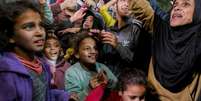 Pessoas celebram anúncio do cessar-fogobanda caça níqueisregião central da Faixa de Gaza,banda caça níqueis15 de janeiro de 2025  Foto: YOUSSEF ALZANOUN/Middle East Images/AFP via Getty Images / BBC News Brasil