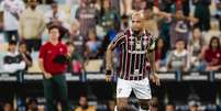 - Foto: Lucas Merçon/Fluminense - Legenda: Felipe Melo em ação com a camisa do Fluminense, onde se tornou ídolo / Jogada10