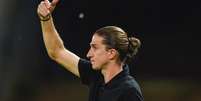  Foto: Marcelo Cortes / CRF - Legenda: Filipe Luís comemora vitória e título do Flamengo / Jogada10
