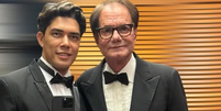 O advogado Christian ao lado do decorador Edgar Moura, viúvo de Gilberto Braga  Foto: Reprodução/Instagram