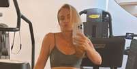 Angélica valoriza barriga sarada em treino, mas presença inesperada na academia rouba a cena.  Foto: Instagram, @angelicaksy / Purepeople