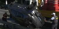 Carro capotou na Marginal Tietê  Foto: Reprodução/TV Globo