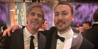 Gints Zilbalodis e Walter Salles no Oscar 2025.  Foto: Reprodução / X