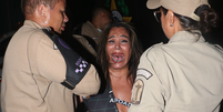 Eita! Mulher acusada de morder pessoas em camarote se defende e faz graves acusações à guarda municipal: 'Mulher vítima de violência'.  Foto: AGNews / Purepeople