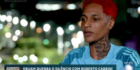 Oruam durante entrevista com Roberto Cabrini  Foto: Record TV / Reprodução