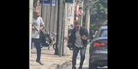 O policial fingiu se render ao suspeito  Foto: Reprodução/X