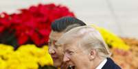 Trump e Xi Jiping em visita do norte-americano à China, em seu primeiro mandato na Presidência dos Estados Unidos  Foto: Thomas Peter-Pool/Getty Images