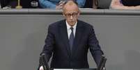 O chanceler alemão Friedrich Merz apresenta seu discurso de política geral no Bundestag, em 14 de maio de 2025. No centro de sua fala, a política externa, a ameaça russa e o fortalecimento da defesa europeia.  Foto: AP - Markus Schreiber / RFI