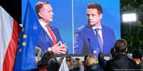 O ultraconservador Karol Nawrocki (esq.) e Rafal Trzaskowski no último debate presidencial antes da eleição polonesa Foto: DW / Deutsche Welle