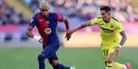  Foto: Judit Cartiel/Getty Images - Legenda: Barcelona perde para o Villarreal, mas torcida comemora título / Jogada10