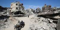 Ruínas na Cidade de Gaza, em imagem desta terça-feira, 20 de maio de 2025.  Foto: REUTERS - Mahmoud Issa / RFI
