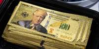 C&eacute;dula de dinheiro com o rosto de Trump  Foto: Getty Images / BBC News Brasil