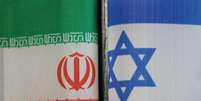 As bandeiras nacionais de Ir&atilde; e Israel  Foto: CFOTO/Future Publishing via Getty Images