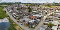 Vila Pantanal, no Boqueirão, em Curitiba (PR). Bairro fica na divisa com São José dos Pinhais. Rio Iguaçu é a fronteira.  Foto: Daniel Castellano/SMCS 