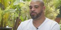  Foto: Adriano Imperador em entrevista ( Reprodução) / Gávea News