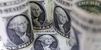O dólar à vista marcou a cotação mínima do pregão de R$5,5469 (-0,39%) às 15h46, quando as exceções à tarifação dos EUA ao Brasil já haviam sido divulgadas  Foto: Reuters
