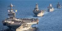 Embarcações da Marinha americana em formação no Mediterrâneo, em 31 de dezembro de 2023 (Imagem de ilustração)  Foto: AFP - MAXWELL ORLOSKY / RFI