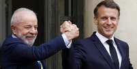 O presidente Lula (PT) ao lado do chefe de Estado francês, Emmanuel Macron  Foto: Antoine Gyori - Corbis / GettyImages
