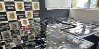 Centenas de celulares apreendidos pela operação da Polícia Civil de São Paulo  Foto: Secretaria de Segurança Pública de São Paulo / Divulgação