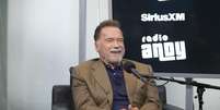 Ator Arnold Schwarzenegger durante entrevista  Foto: Noam Galai / Getty Images