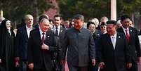 Xi e Putin foram flagrados falando sobre transplante e vida at&eacute; os 150 anos  Foto: AFP via Getty Images / BBC News Brasil
