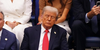 Trump foi flagrado de olhos fechados durante a final do US Open  Foto: Reprodução/X
