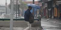 Tempo frio e chuvoso na região central de São Paulo, com termômetro marcando 19º graus, nesta sexta-feira, 10. A cidade de São Paulo deve voltar a registrar temperaturas elevadas no domingo, 12, feriado de Nossa Senhora Aparecida.  Foto: WILLIAN MOREIRA/ATO PRESS/ESTADÃO CONTEÚDO
