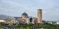 Milhares de fiéis rumam à Aparecida neste domingo, 12, quando é celebrado o dia de Nossa Senhora Aparecida  Foto: BETE MARQUES/O FOTOGRÁFICO/ESTADÃO CONTEÚDO