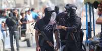 Forças de segurança ligadas ao Hamas foram mobilizadas em toda a Faixa de Gaza para supervisionar a transição após a retirada israelense  Foto: Anadolu via Getty Images / BBC News Brasil