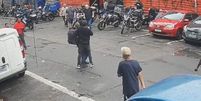 Imagens de câmera de segurança mostram ação na região da 25 de março  Foto: Reprodução/Band