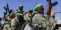 Combatentes do Hamas armados  Foto: AFP via Getty Images / BBC News Brasil