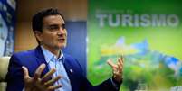O ministro do Turismo Celso Sabino: 'Financiamos a ampliação de hotéis que já existiam'.  Foto: WILTON JUNIOR/ESTADÃO / Estadão