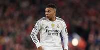  Foto: Michael Regan/Getty Images - Legenda: Mbappé em ação na partida contra o Liverpool, pela 4ª rodada da fase de liga da Champions / Jogada10