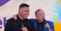 Ao lado de Galv&atilde;o (&agrave; direita), Ronaldo pediu para ser comentarista de futebol no SBT  Foto: Reprodu&ccedil;&atilde;o/SBT